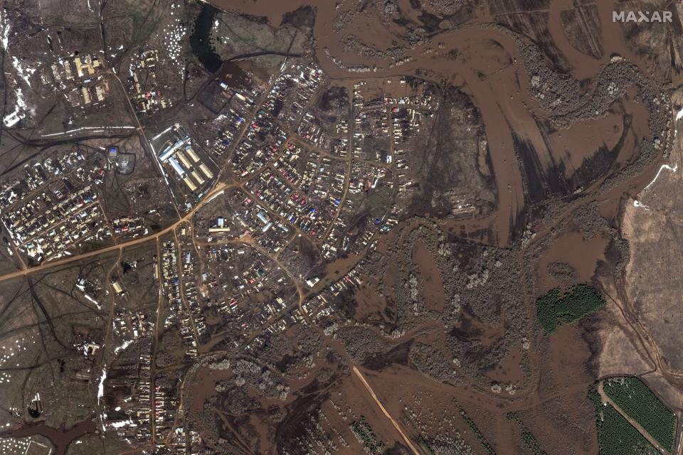 This image provided by Maxar Technologies, shows flooded areas around the Buzuluk river in Andreevka, Russia, Monday, April 8, 2024. State media say Russia's government has declared the situation in flood-hit areas in the Orenburg region a federal emergency. (Satellite image ©2024 Maxar Technologies via AP)