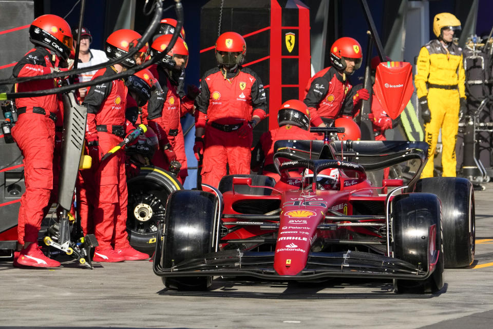 Ferrari driver Charles Leclerc of Monaco steers his car out of pit lane after a tire change during the Australian Formula One Grand Prix in Melbourne, Australia, Sunday, April 10, 2022. (Simon Baker, Pool via AP)