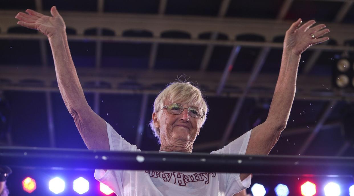 A contestant in the wet T-shirt competition, who signed up under the name “Sexy Grandma”, waves during her performance in Dirty Harry’s Pub in Daytona, FL during Bike Week on Friday, March 5, 2021. She placed first after receiving the loudest audience applause. (Sam Thomas/Orlando Sentinel)