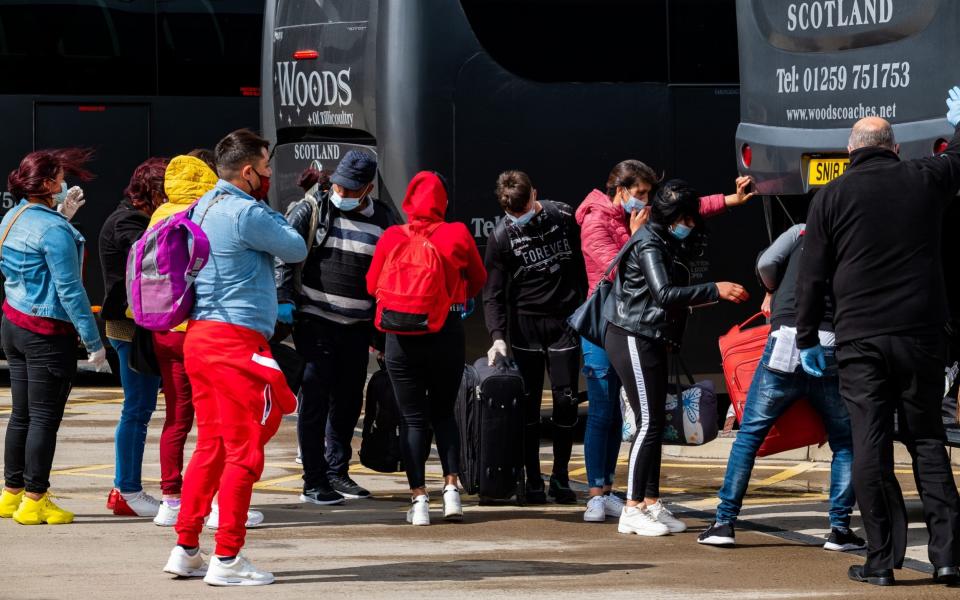 170 migrant workers from Romania and Bulgaria arrived on a charter flight into Edinburgh Airport in May  - Stuart Nicol/Stuart Nicol Photography