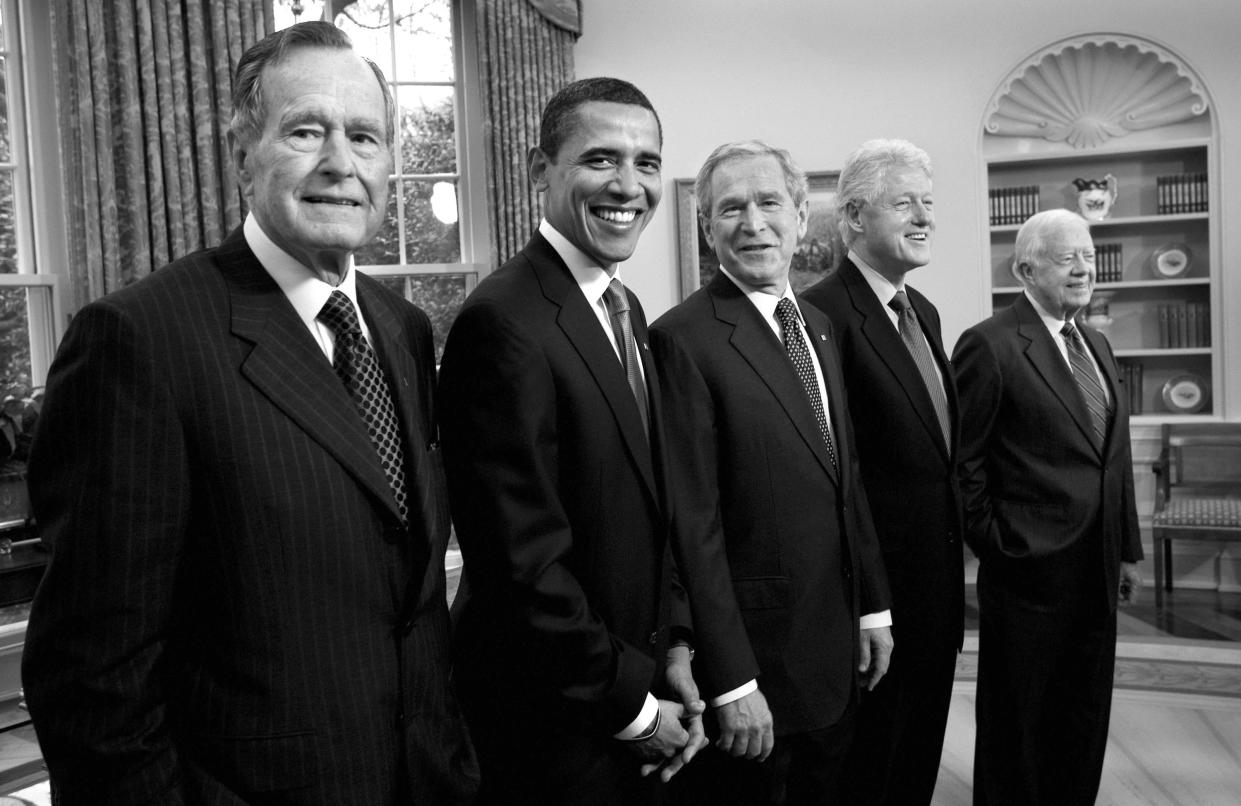 WASHINGTON - JANUARY 7: Former President George H.W. Bush, President-elect Barack Obama, President George W. Bush, and former presidents Bill Clinton and Jimmy Carter pose together in the Oval Office on January 7, 2009 at the White House in Washington, D.C. This was only the fifth time that five presidents have appeared together. 