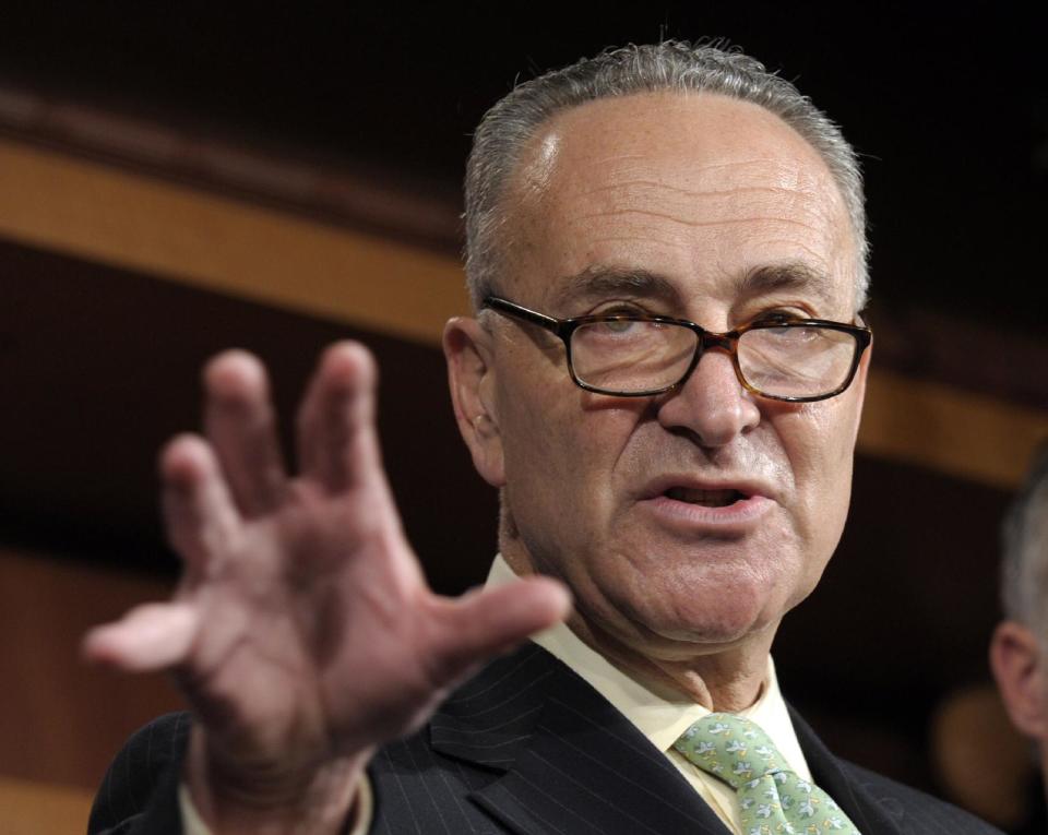 FILE - In this May 17, 2012 file photo, Sen. Charles Schumer, D-N.Y. gestures during a news conference on Capitol Hill in Washington. Democrats want to push tax cuts through the Senate for companies that hire new workers, give raises or buy major new equipment this year. With neither party eager to let the other claim campaign-season victories, the ultimate fate of the roughly $29 billion legislation seems dubious. Debate was to begin Tuesday, though it was possible Republicans would use procedural blockades to quickly derail the measure. (AP Photo/Susan Walsh, File)