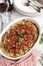 <p>There are few things more quintessentially Southern than a rich, creamy casserole. Here, thick-cut bacon and crunchy fried shallots add to the already obvious appeal.</p><p><strong><a href="https://www.thepioneerwoman.com/food-cooking/recipes/a80624/thanksgiving-dinner-green-bean-casserole/" rel="nofollow noopener" target="_blank" data-ylk="slk:Get the recipe.;elm:context_link;itc:0;sec:content-canvas" class="link ">Get the recipe.</a></strong></p>