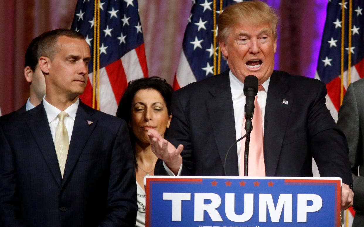 Corey Lewandowski with Donald Trump during the election campaign - AP