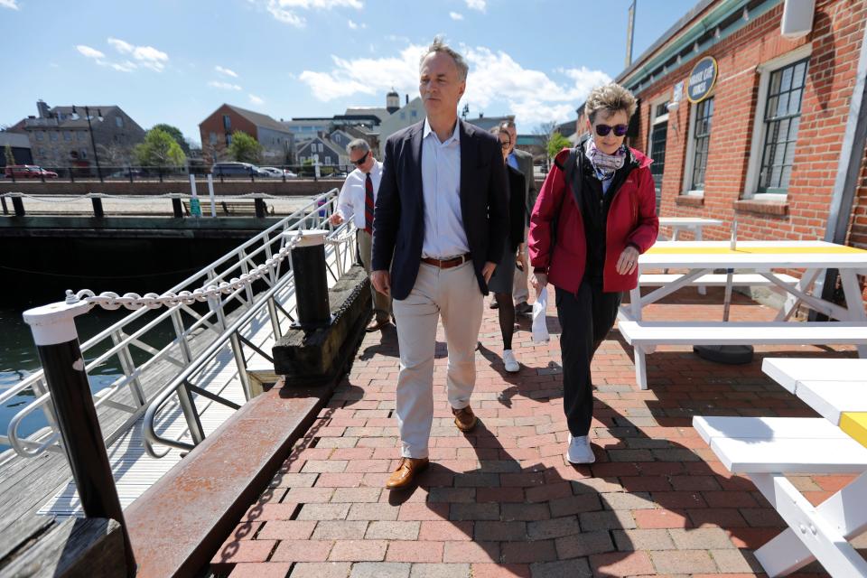 New Bedford Mayor Jon Mitchell gives U.S. Department of Transportation Maritime Administration (MARAD) Rear Admiral Ann C. Phillips a tour of New Bedford harbor.