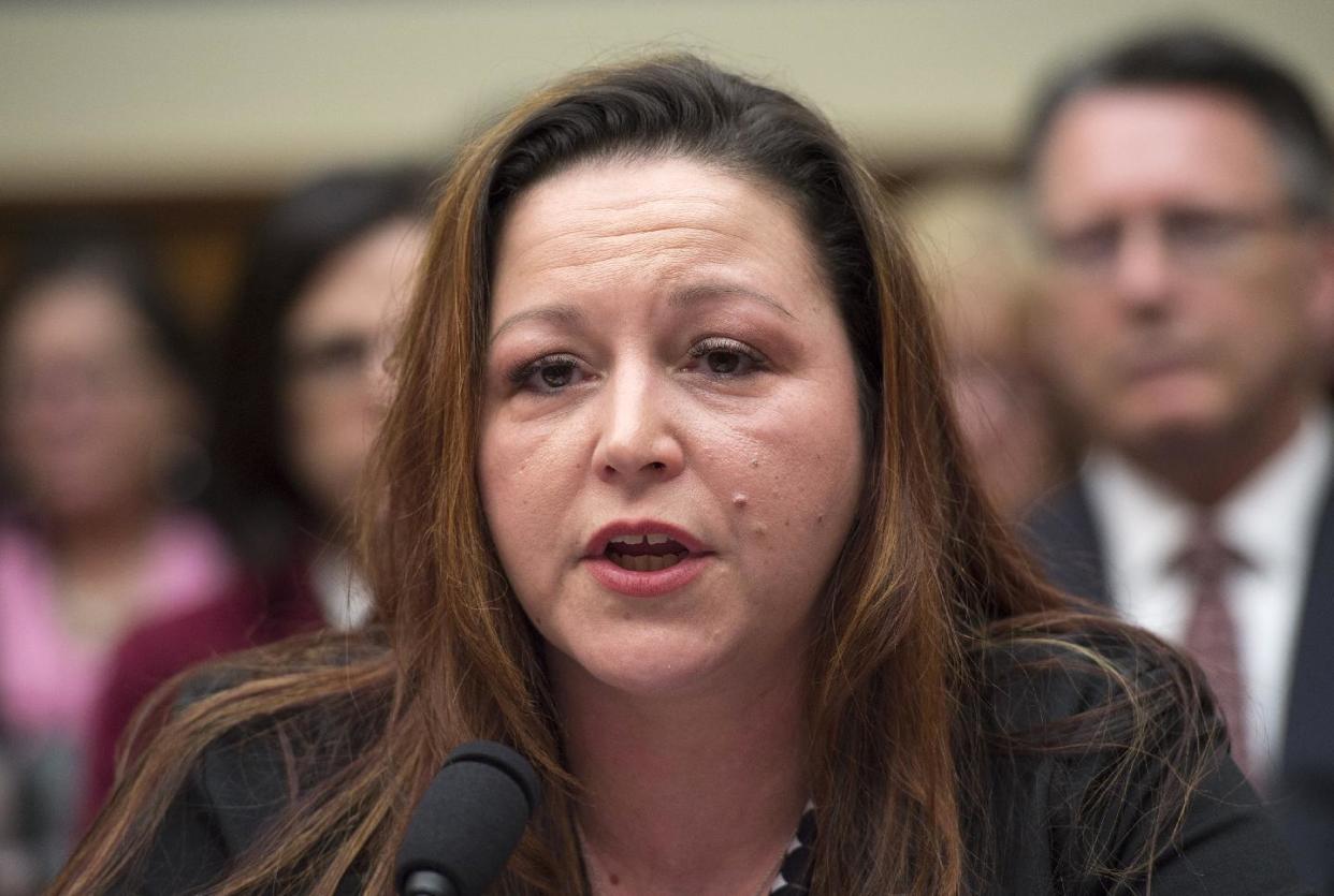 CLICK IMAGE for slideshow: Flint, Mich. resident LeeAnne Walters testifies before the House Oversight and Government Reform Committee Feb. 3, 2016. (Photo: Molly Riley/AP Photo)