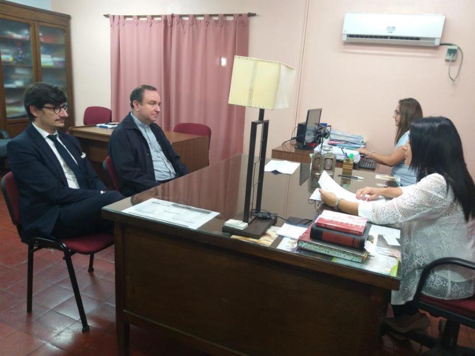 In this handout photo provided by Salta's government Judicial Branch Press Office, Argentine bishop Gustavo Zanchetta, second from left, a cleric close to Pope Francis, appears alongside his lawyer, Javier Belda Iniesta, at a judicial hearing in Oran, the northwestern province of Salta, Argentina, Wednesday, Nov. 27, 2019. Zanchetta was notified by members of the court that he will be put on trial for alleged abuses against two former seminarians. (Salta's government Judicial Branch Press Office via AP)