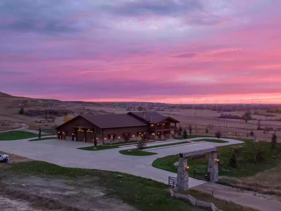 North Dakota home with pink sunset in the background