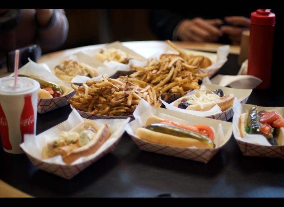 Hefty portions of thin, freshly cut fries come in three distinct varieties at <a href="http://www.gogobot.com/hot-dougs-chicago-restaurant" target="_hplink">Hot Doug's</a>: standard, smothered in cheese, and with duck fat.