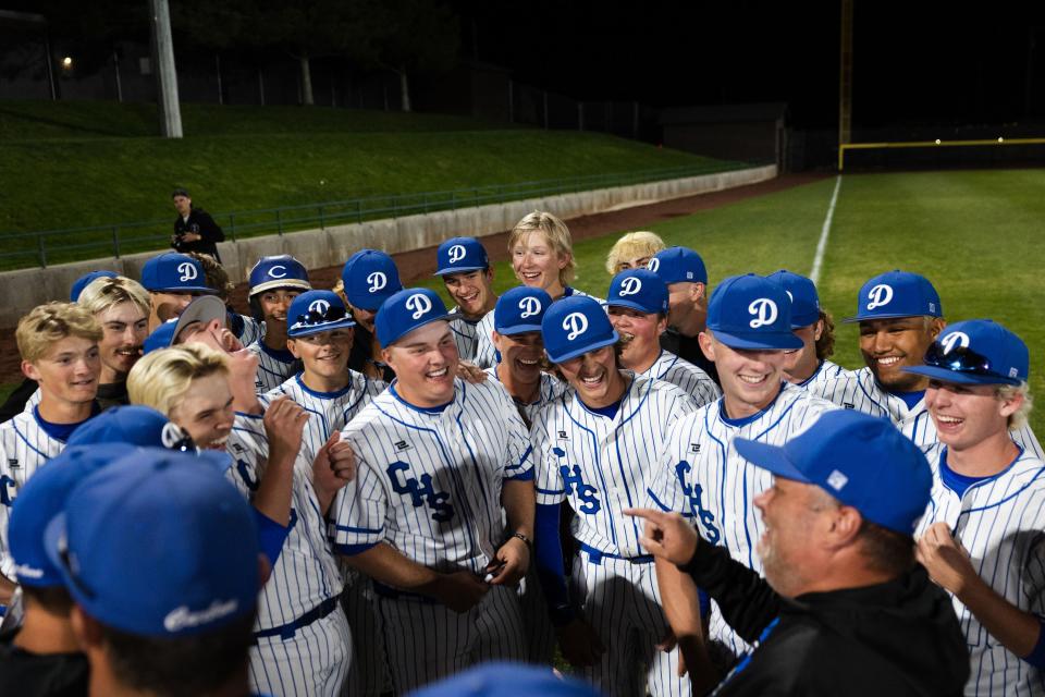 Carbon huddles after winning the 3A boys baseball quarterfinals at Kearns High School in Kearns on May 11, 2023. | Ryan Sun, Deseret News