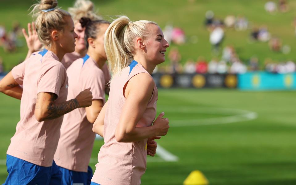 Chloe Kelly leads a light jog during training at the Sunshine Coast Stadium - Behind the scenes with the Lionesses at the World Cup: Whale watching, kangaroos and board games