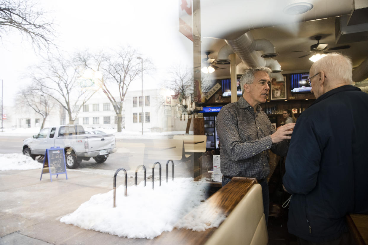 Republican presidential candidate Joe Walsh (center) is seen through a window during a campaign event at Riley's Cafe on Jan. 29, 2020, in Cedar Rapids, Iowa. (Photo: Matt Rourke/ASSOCIATED PRESS)