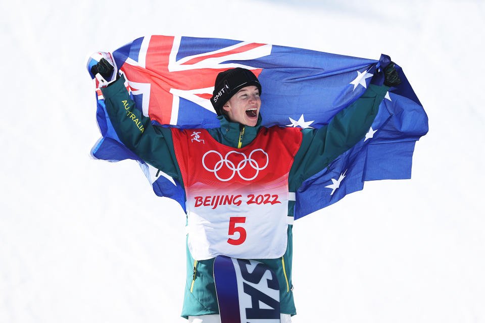 Seen here, Australia's Tess Coady celebrates after winning the bronze medal in the women's snowboard slopestyle at the Beijing Winter Games. 