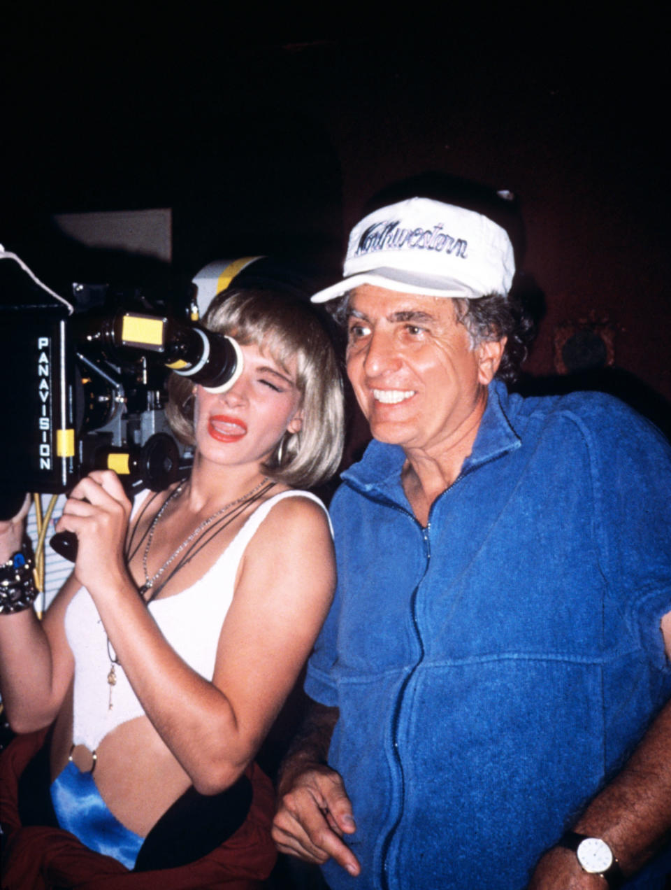 Julia Roberts holding a camera while Garry Marshall watches on