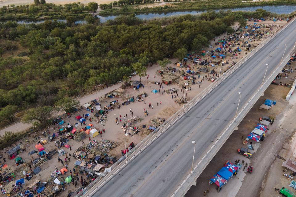 Migrants, many from Haiti, are camped along the Del Rio International Bridge on Sept. 22 in Texas.