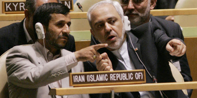 UNITED NATIONS, UNITED NATIONS:  Iranian President Mahmoud Ahmadinejad (L) confers with Javad Zarif (R), Iran's United Nations ambassador, during the United Nations General Assembly 19 September 2006 at UN headquarters in New York.   AFP PHOTO/Stan HONDA  (Photo credit should read STAN HONDA/AFP/Getty Images) (Photo: )