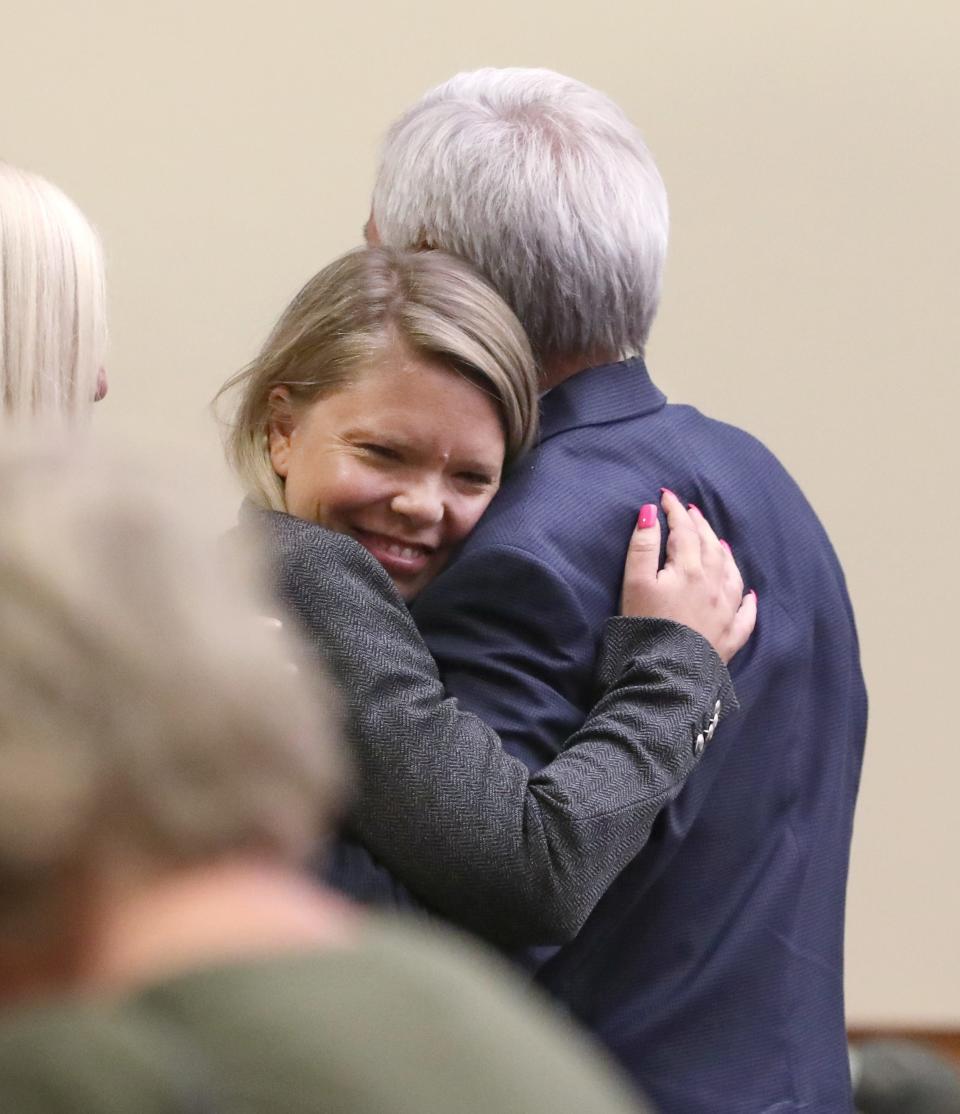 James Krauseneck Jr., right, gets a hug from his daughter Sara, after his defense team gave there closing arguments in his murder trial at the Hall of Justice in Rochester Thursday, Sept. 22, 2022.   Krauseneck is on trial for the ax murder of his wife in 1982, when daughter Sara was 3 and a half years old and home at the time of the murder. 