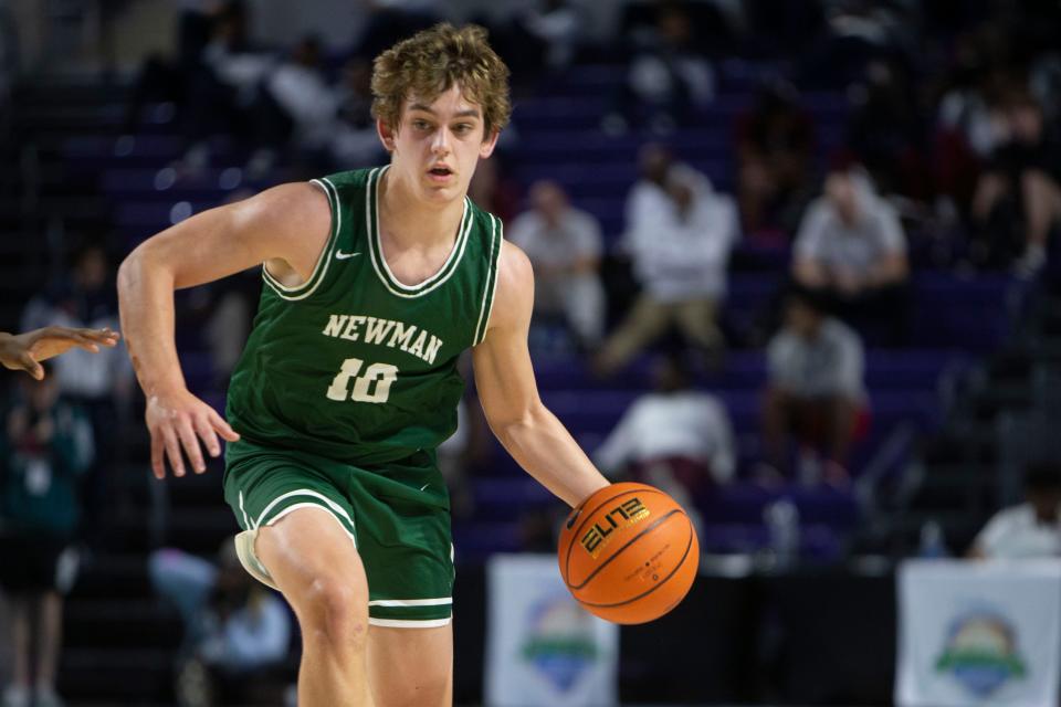 Isidore Newman's Arch Manning (10) dribbles the ball during the first half of the 2021 City of Palms Classic game between Oak Hill Academy and Isidore Newman, Saturday, Dec. 18, 2021, at Suncoast Credit Union Arena in Fort Myers, Fla.Oak Hill Academy led Isidore Newman 30-20 at halftime.