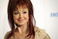 FILE - Naomi Judd poses at the Hero Dog Awards at the Beverly Hilton Hotel in Beverly Hills, Calif., Oct. 6, 2012. Judd, the Kentucky-born matriarch of the Grammy-winning duo The Judds and mother of Wynonna and Ashley Judd, has died, her family announced Saturday, April 30, 2022. She was 76. (Photo by Chris Pizzello/Invision/AP, File)