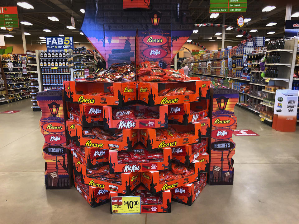 Halloween candy is displayed at a store, Wednesday, Sept. 23, 2020, in Freeport, Maine. Earlier Halloween displays at some chains stores likely helped boost sales. But Americans may also be in a mood to celebrate after months of pandemic anxiety. (AP Photo/Robert F. Bukaty)