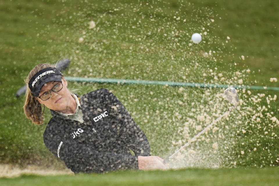 Brooke Henderson, of Canada, hits a bunker shot on the fourth hole during the final round of the Chevron Championship LPGA golf tournament Sunday, April 21, 2024, at The Club at Carlton Woods in The Woodlands, Texas. (AP Photo/Eric Gay)