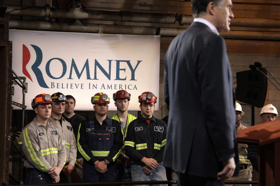 Consol Energy Research and Development Facility employees listen to Republican presidential candidate, former Massachusetts Gov. Mitt Romney at a campaign rally in South Park Township, Pa., Monday, April 23, 2012. (AP Photo/Jae C. Hong)