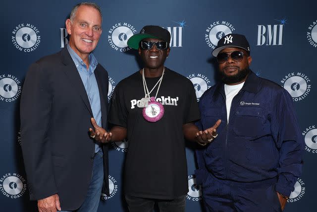 <p>JC Olivera for BMI</p> Mike O'Neill, Flavor Flav and Prophet R