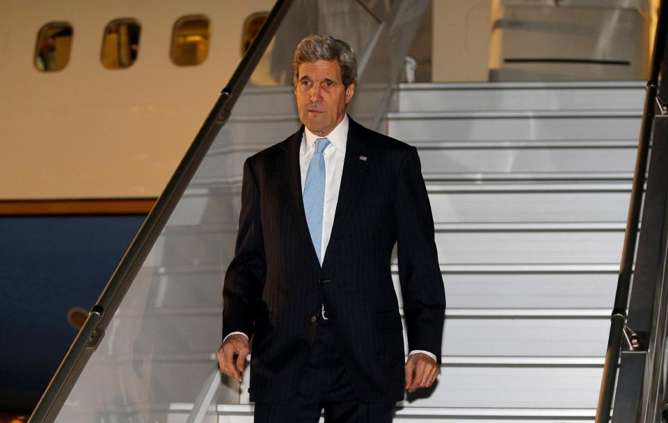 Secretary of State John Kerry arrives in Geneva, Wednesday, April 16, 2014, where he is scheduled to participate in talks on the ongoing situation in Ukraine with representatives from Ukraine, Russia and the European Union. (AP Photo/Jim Bourg, Pool)