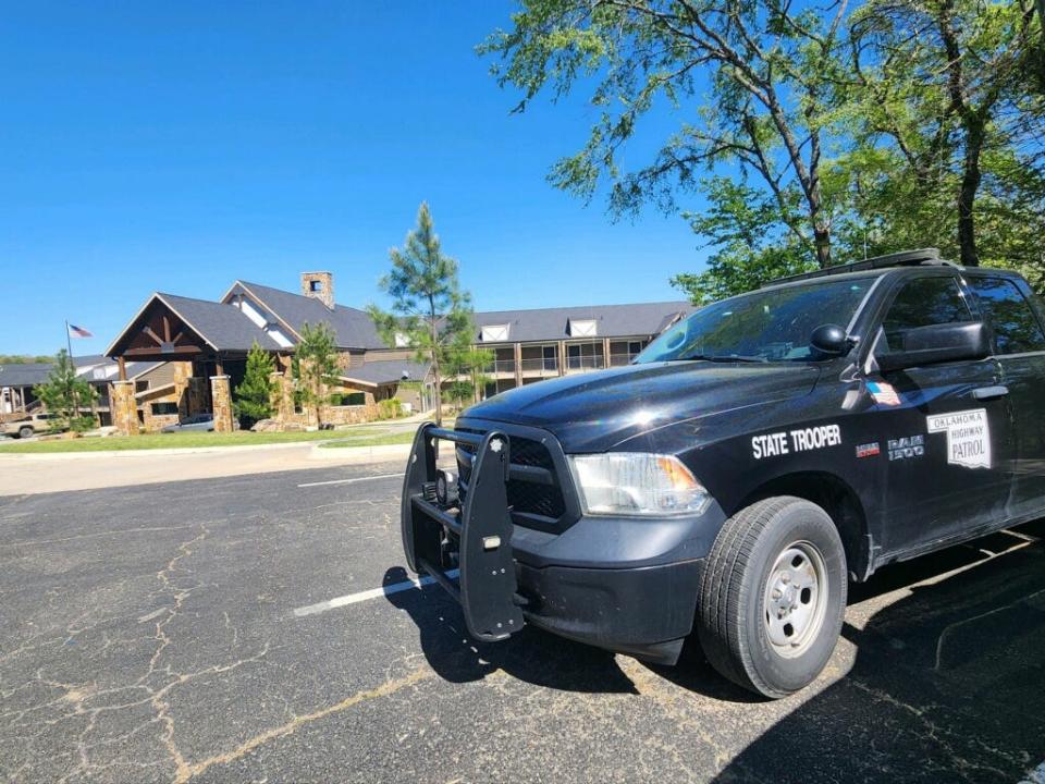 An Oklahoma Highway Patrol vehicle stationed outside Beavers Bend Lodge in Beavers Bend State Park, just outside of Hochatown, ahead of the eclipse.