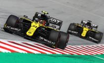 Renault's French driver Esteban Ocon (L) steers his car in front of Renault's Australian driver Daniel Ricciardo during the Formula One Styrian Grand Prix race on July 12, 2020 in Spielberg, Austria. (Photo by Mark Thompson / POOL / AFP) (Photo by MARK THOMPSON/POOL/AFP via Getty Images)