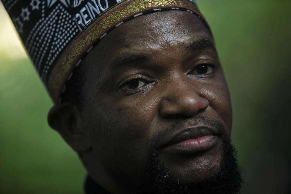 King Tchongolola Tchongonga Ekuikui VI, of Angola's Bailundo kingdom, visits the "Quilombo do Camorim," a community of descendants of runaway slaves, many from Angola, in Rio de Janeiro, Brazil, Wednesday, Nov. 8, 2023. (AP Photo/Bruna Prado)