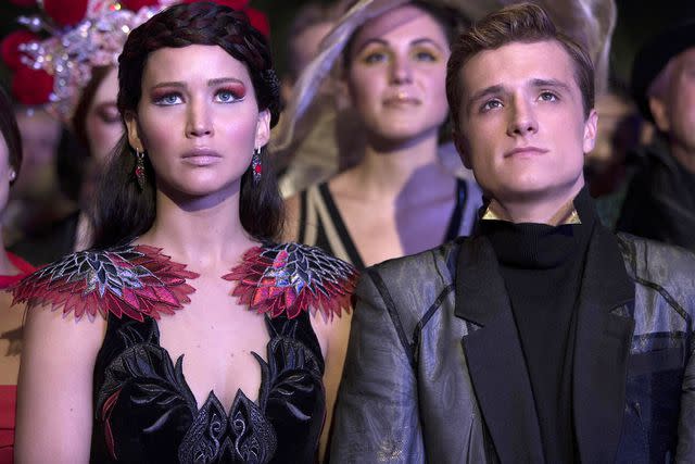 Lionsgate/Kobal/Shutterstock Jennifer Lawrence and Josh Hutcherson in <em>The Hunger Games: Catching Fire</em> (2013)