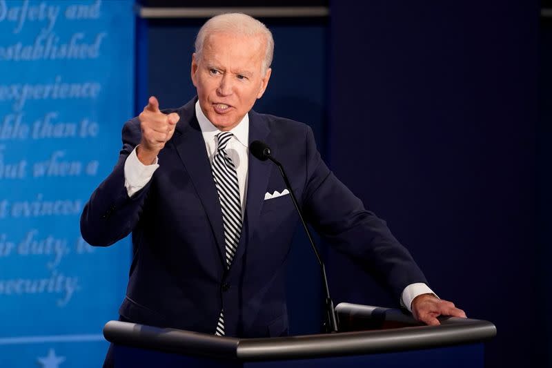 U.S. President Donald Trump and Democratic presidential nominee Joe Biden participate in their first 2020 presidential campaign debate in Cleveland