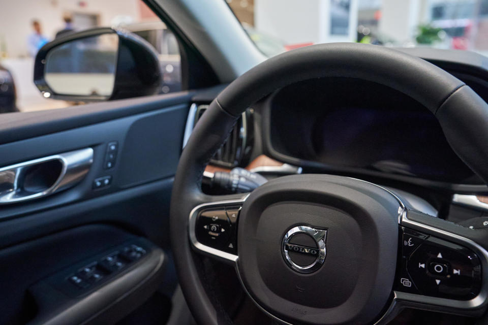 The steering wheel of a 2024 Volvo S60 Recharge plug-in hybrid vehicle at a dealership in New York on Jan. 30, 2024.  / Credit: Bing Guan of Bloomberg via Getty Images