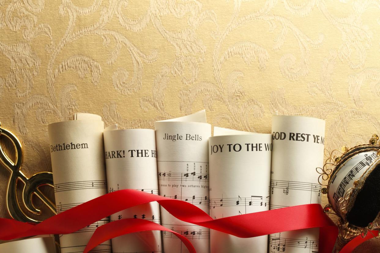 christmas sheet music rolled up