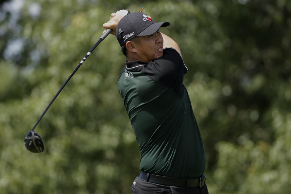 Byeong Hun An of South Korea, watches his tee shot on the ninth hole during the second round of the World Golf Championship-FedEx St. Jude Invitational Friday, July 31, 2020, in Memphis, Tenn. (AP Photo/Mark Humphrey)