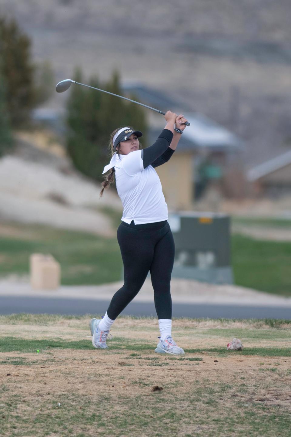 Pueblo East's Mariah Gonzales tracks her tee shot on the 4th hole during a tournament at Four Mile Ranch Golf Club on April 13.