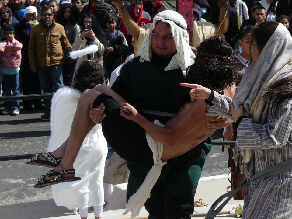 Good Friday worshippers braved the wind and cold outside of St. Joan of Arc Catholic Church in Victorville to observe and participate in a live presentation of Stations of the Cross.