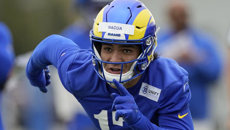 Los Angeles Rams wide receiver Puka Nacua runs a play during the NFL football team’s organized activities Wednesday, May 31, 2023, in Thousand Oaks, Calif. (AP Photo/Mark J. Terrill)