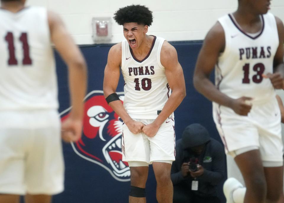 Perry Pumas forward Koa Peat (10) screams out after a dunk against the Basha Bears at Perry High School in Gilbert on Jan. 6, 2024.