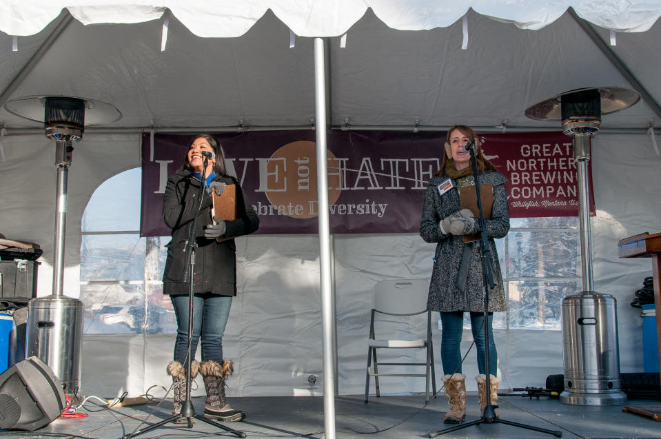(L to R) Love Not Hate organizers and Whitefish, MT, residents Dominca Kau'ano Cleveras and Jessica Loti Laferriere welcoming the crowd and introducing the speakers at Love Not Hate. (Photo: Lauren Grabelle)