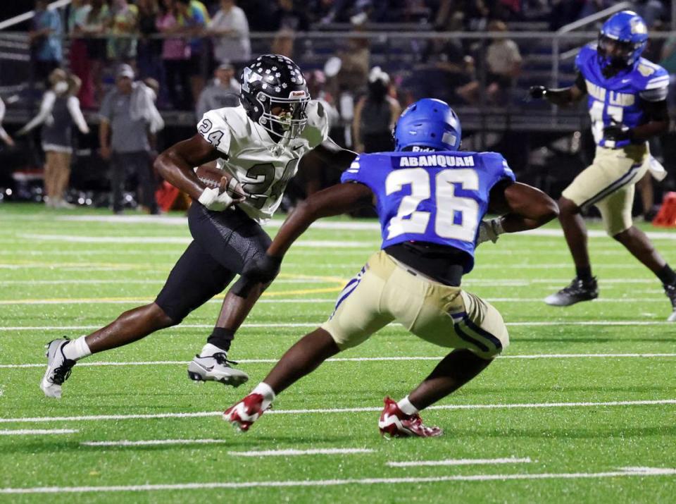 York’s Javarus Guthrie carries the ball against Indian Land’s Justin Abanquah on Friday, Sept. 29, 2023