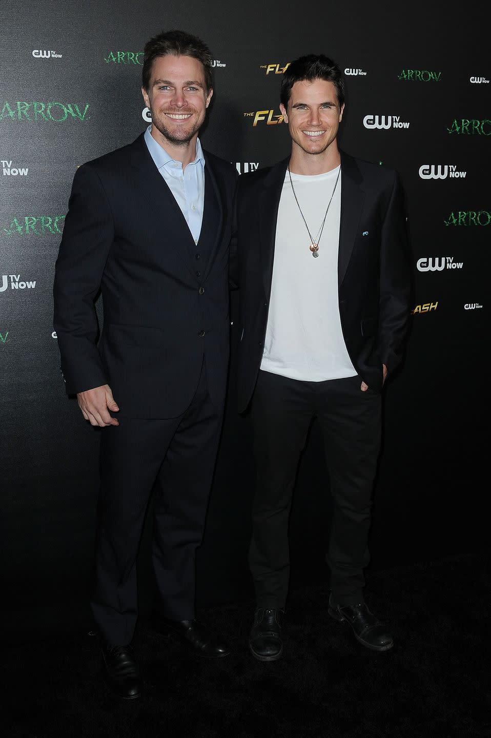 <p>Although at first glance these leading men look like brothers, Stephen Amell and Robbie Amell are actually first cousins. They've both played superheroes in the DC Universe, but the Canadian cousins are far from competitive—Robbie almost landed the lead role in <em>Arrow</em>, but <a href="https://www.youtube.com/watch?v=bISaA18pKA4" rel="nofollow noopener" target="_blank" data-ylk="slk:convinced Stephen to audition;elm:context_link;itc:0;sec:content-canvas" class="link ">convinced Stephen to audition</a> instead.</p>