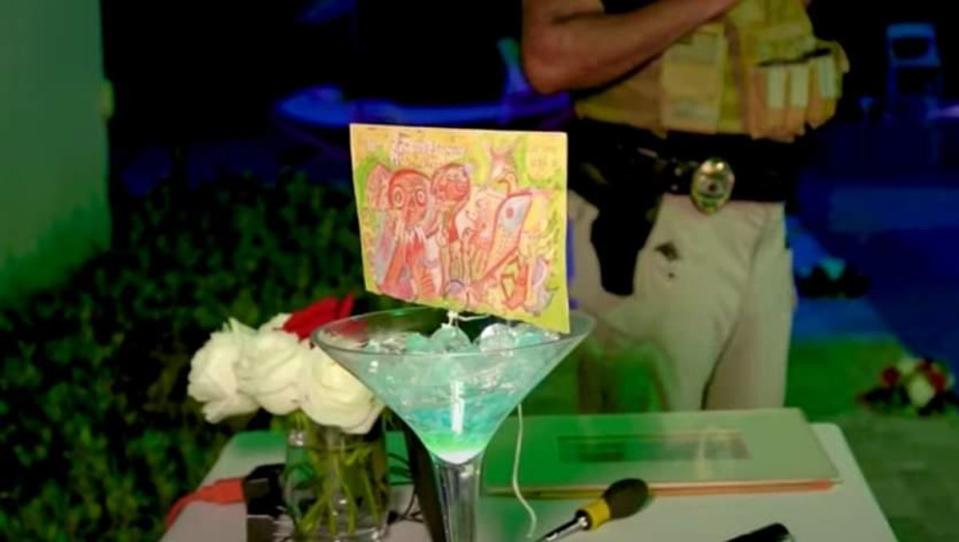 The martini glass with Kahlo’s drawing in it. The drawing was then set on fire. (Twitter Alex Valdes)