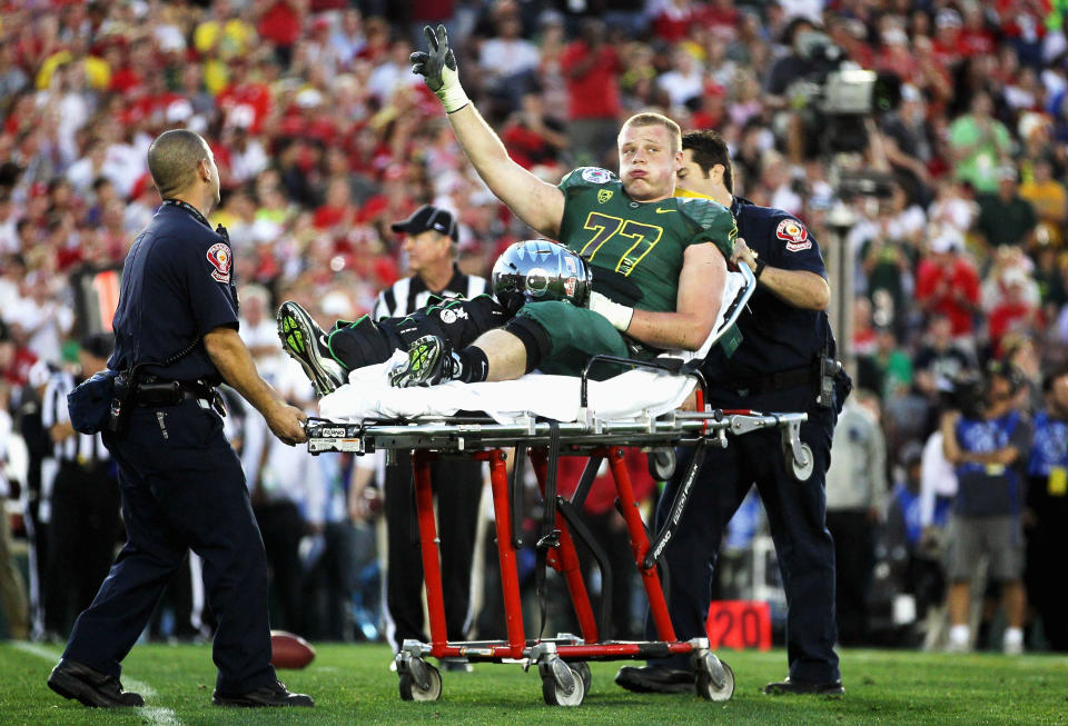 PASADENA, CA - JANUARY 02: Offensive lineman Carson York #77 of the Oregon Ducks is carted off the field after an injury in the second half as the Ducks take on the Wisconsin Badgers at the 98th Rose Bowl Game on January 2, 2012 in Pasadena, California. (Photo by Jeff Gross/Getty Images)