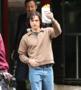 <p>Tom Holland shows off his tasty fish and chips while on the set of <em>The Crowed Room</em> on May 24 in N.Y.C.</p>