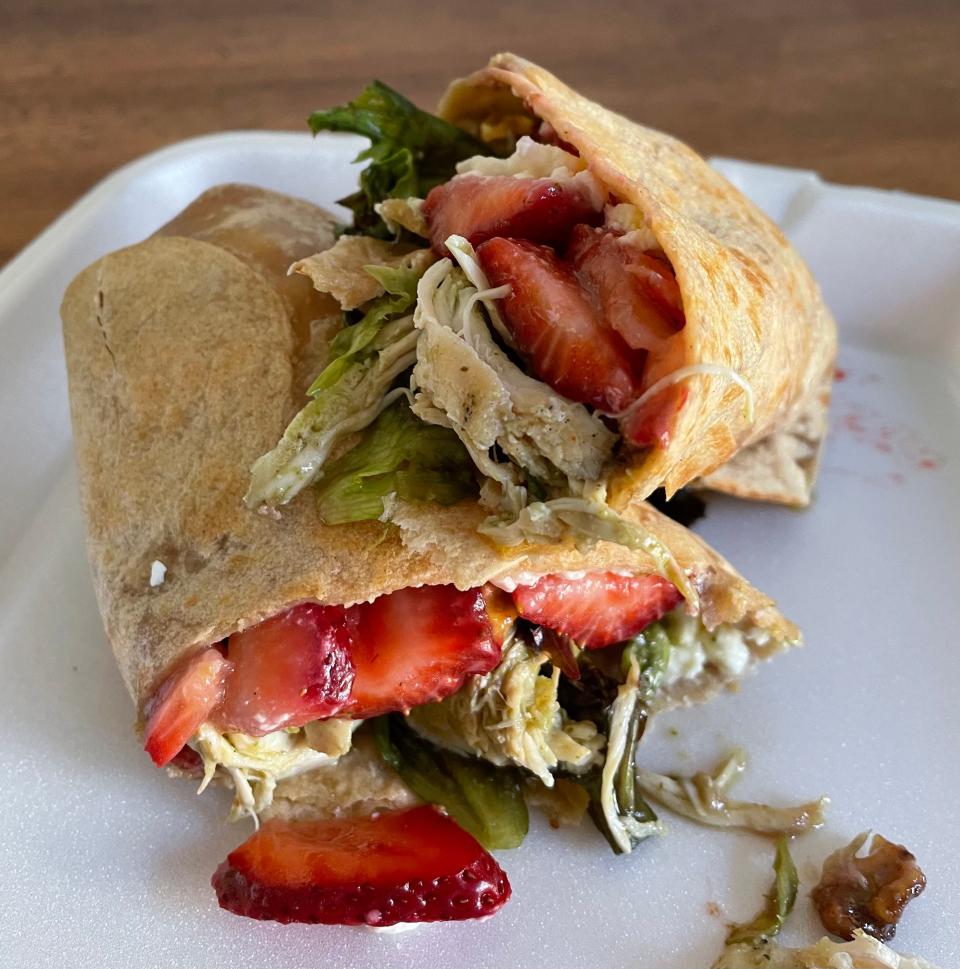 The Strawberry Thriller wrap has fresh strawberries, feta cheese, grilled chicken, field greens, glazed walnuts and basil vinaigrette.