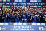 <p>AFC Wimbledon capped the 14th anniversary of their foundation by winning promotion to League One by beating Plymouth Argyle at Wembley. And guess who awaited them in that division? MK Dons. </p>