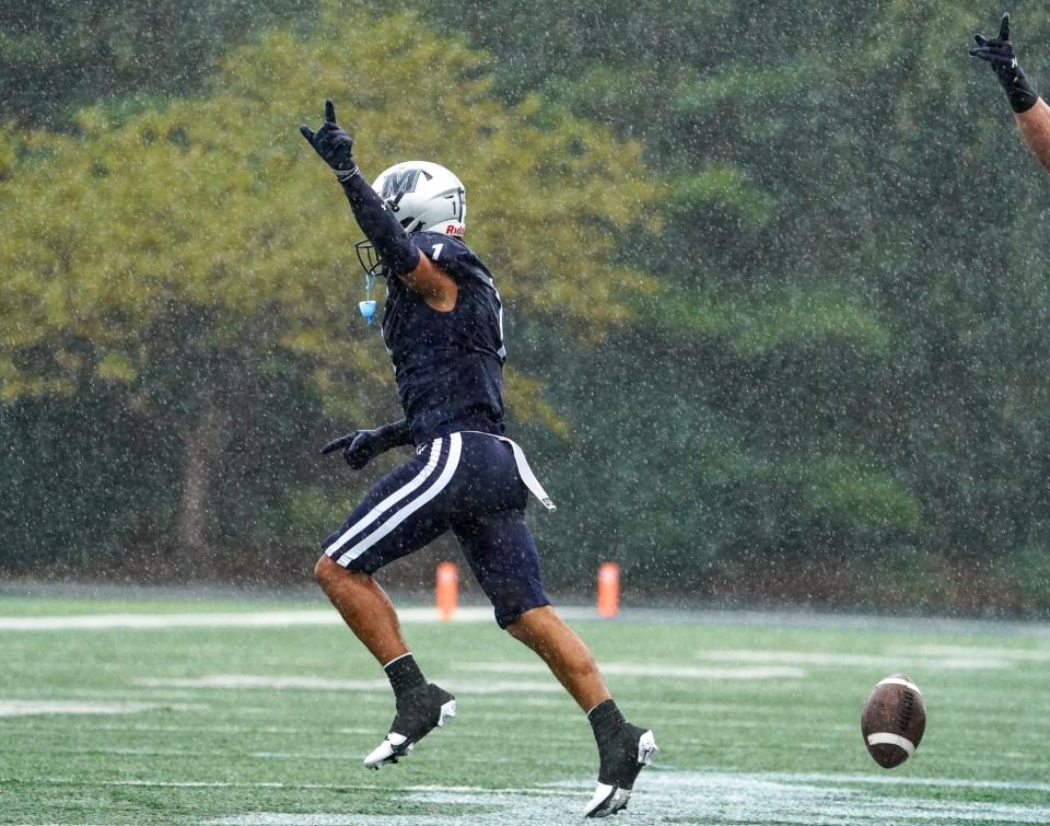 Monmouth cornerback Eddie Morales celebrates after making an interception during the Hawks' 61-10 victory over Hampton on Oct. 14, 2023 in West Long Branch, N.J.