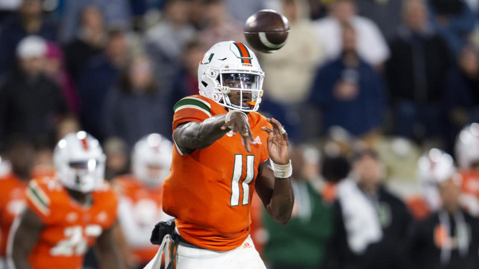 Miami quarterback Jacurri Brown throws in the second half of an NCAA college football game against Georgia Tech, Saturday, Nov. 12, 2022, in Atlanta. (AP Photo/Hakim Wright Sr.)